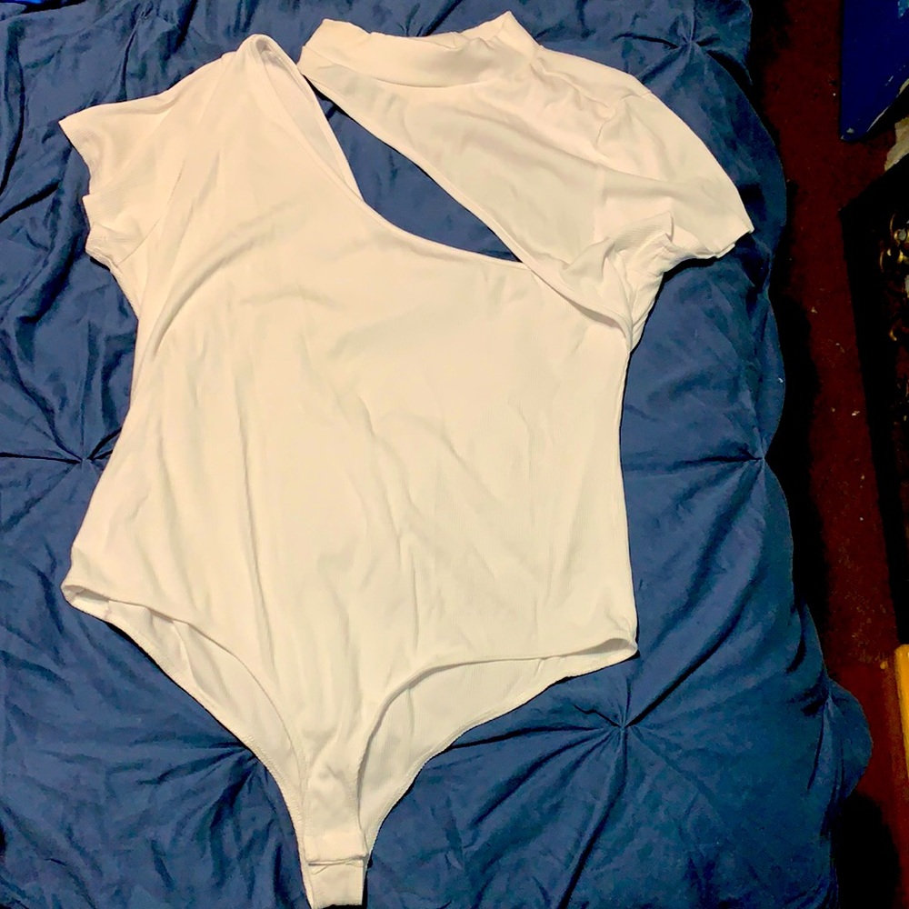 Women white body suit. Size large. Limited wear